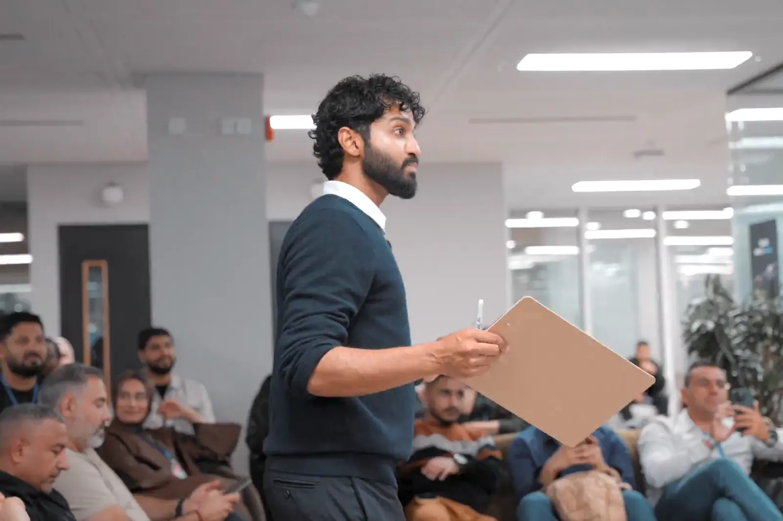 An organiser briefing participants at Buildathon London 2026